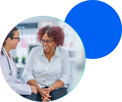 A clinician speaking with a patient